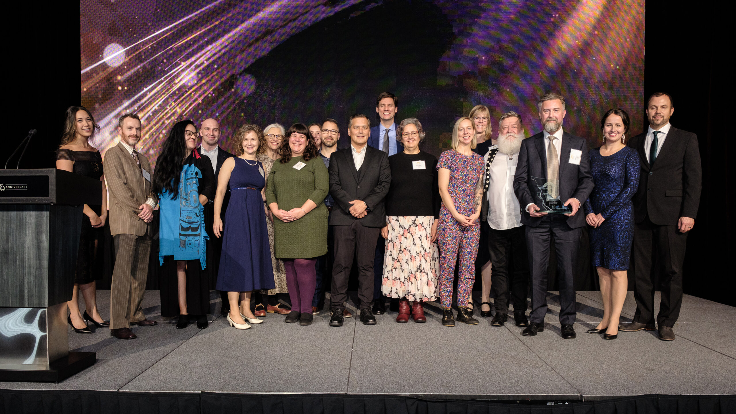 Representatives from CFN, Haida and Gitga’at Nations, along with Community Clean Energy Branch, New Relationship Trust and BC Hydro, gather on stage during the 2024 Premier’s Awards. Photo: D. Craig.