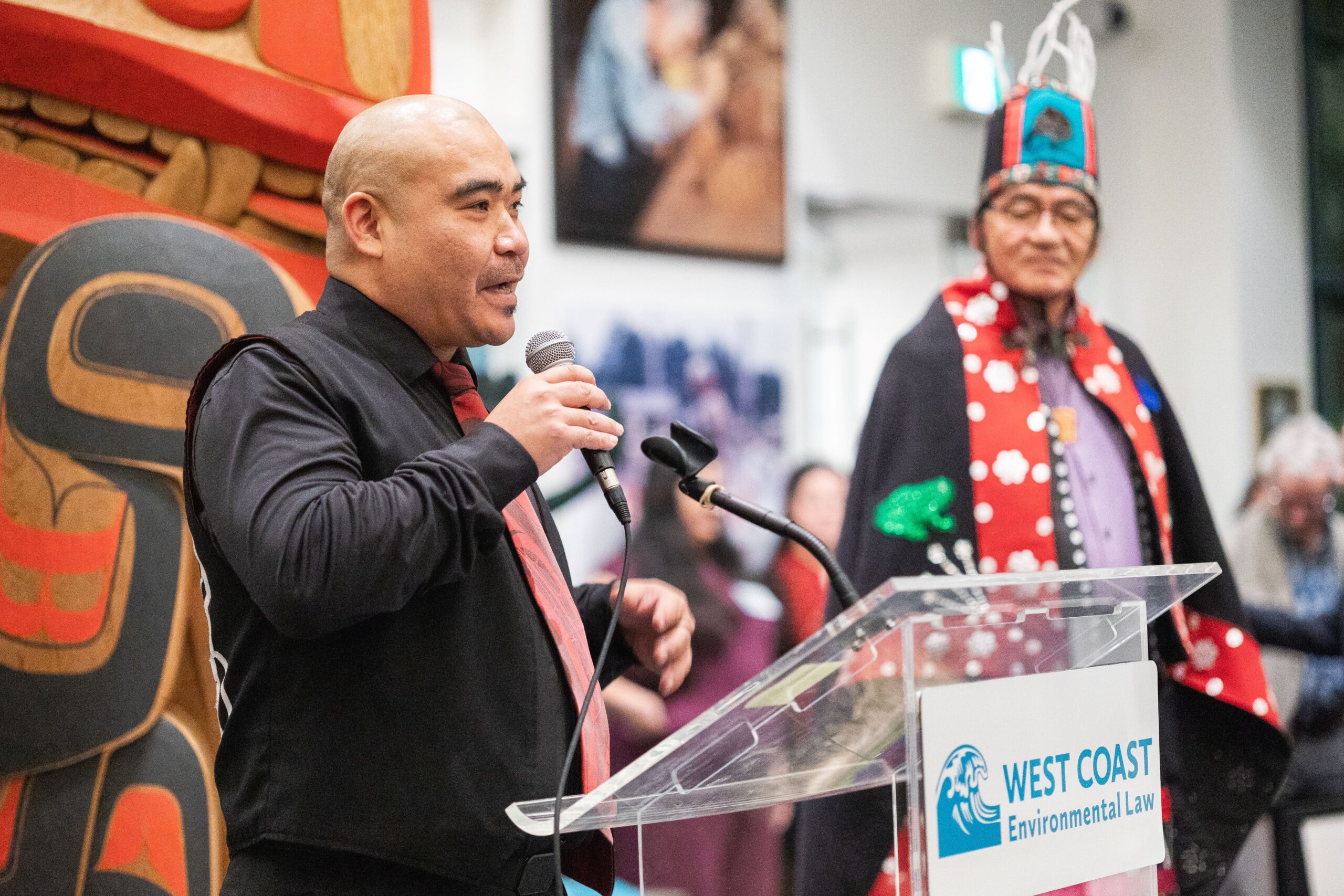 Doug Neasloss, Chief Councillor for the Kitasoo Xai’xai Nation, speaks after receiving his award as Wet’suwet’en Hereditary Chief Na’Moks looks on. Photo credit: Jamie Poh / Hayf Photography.